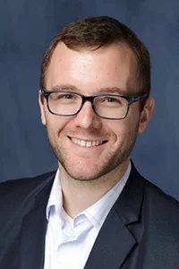 A headshot of Josh Brown
