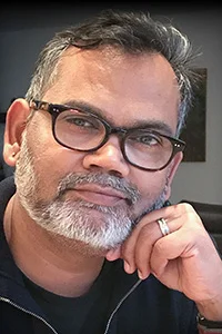 A headshot of Krishna Vaddiparti
